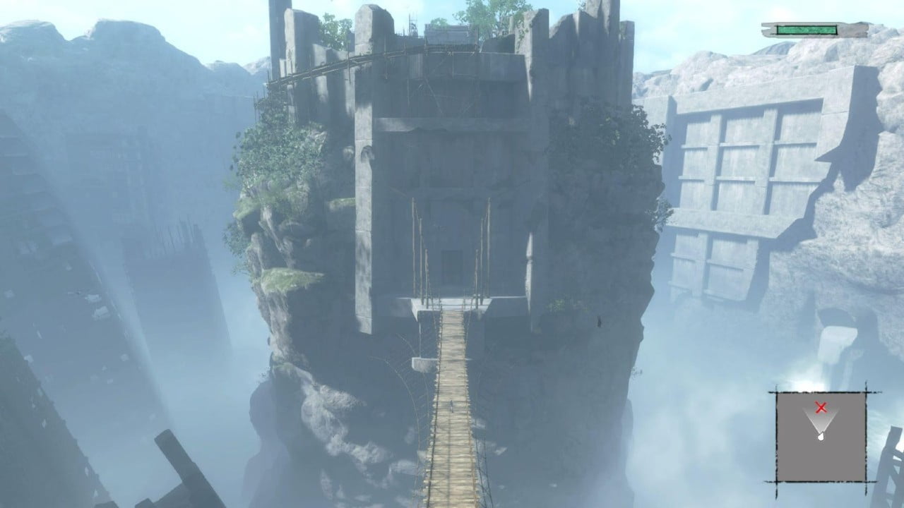 The decaying bridge leading to an ancient monument.