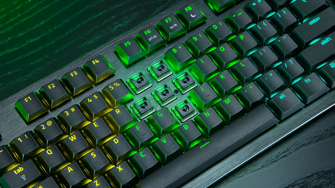 Close-up of the Razer Huntsman V3 Pro Low-profile keyboard with several keycaps removed to show its analogue optical switches.