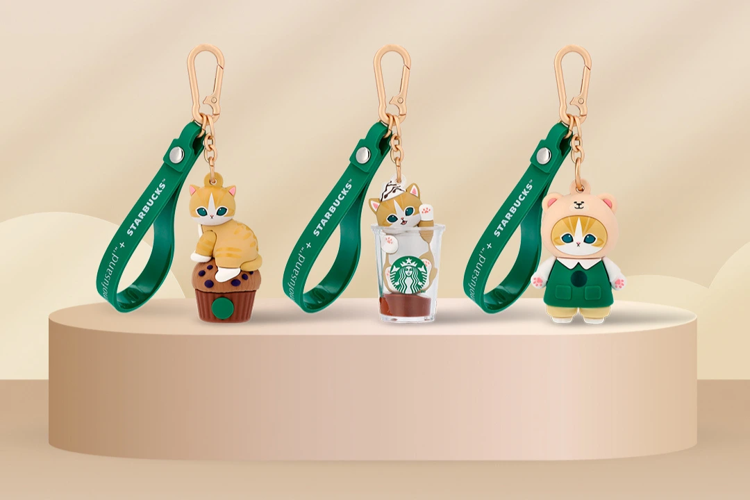 Three Mofusand x Starbucks blind-box keychains featuring cat characters with Starbucks-themed designs.