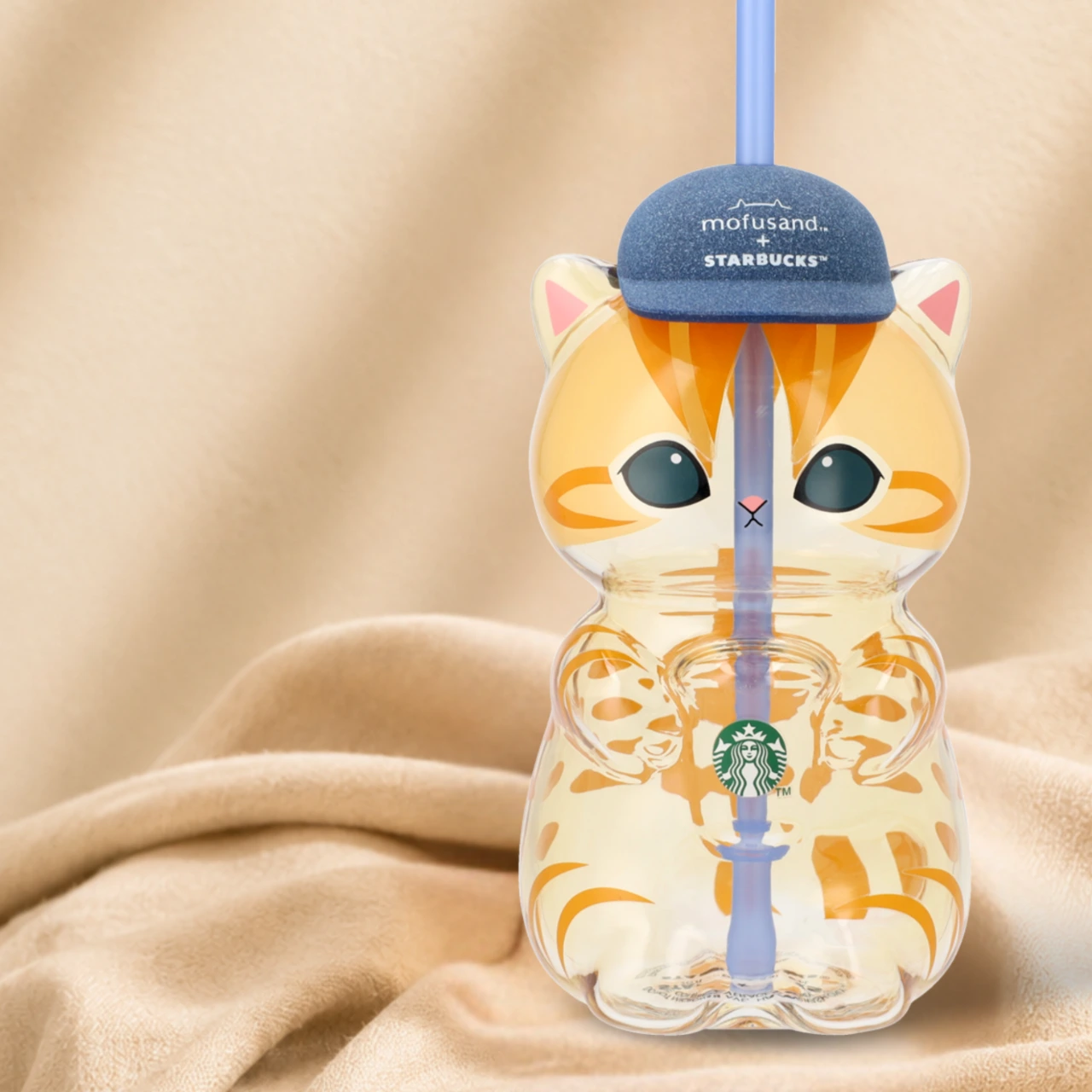 Mofusand cat-shaped Starbucks Glass Cold Cup with blue cap and straw.