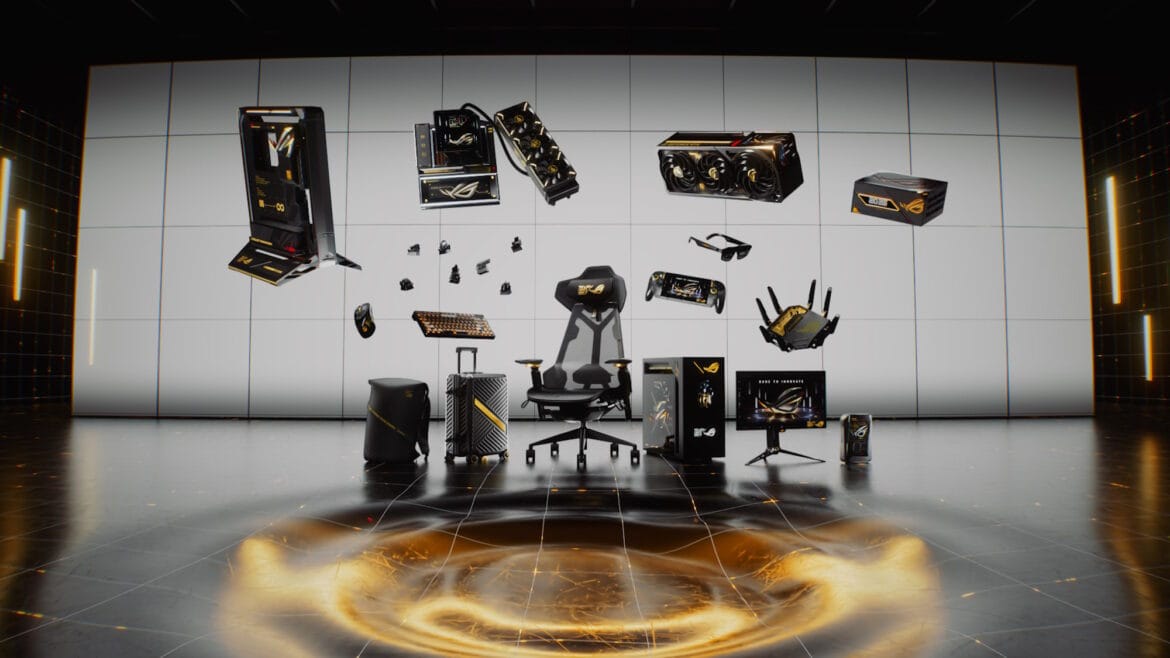 ROG Edition 20 products arranged in a black-and-gold anniversary display, including PC components, peripherals, a chair, monitor, handheld, router and luggage.