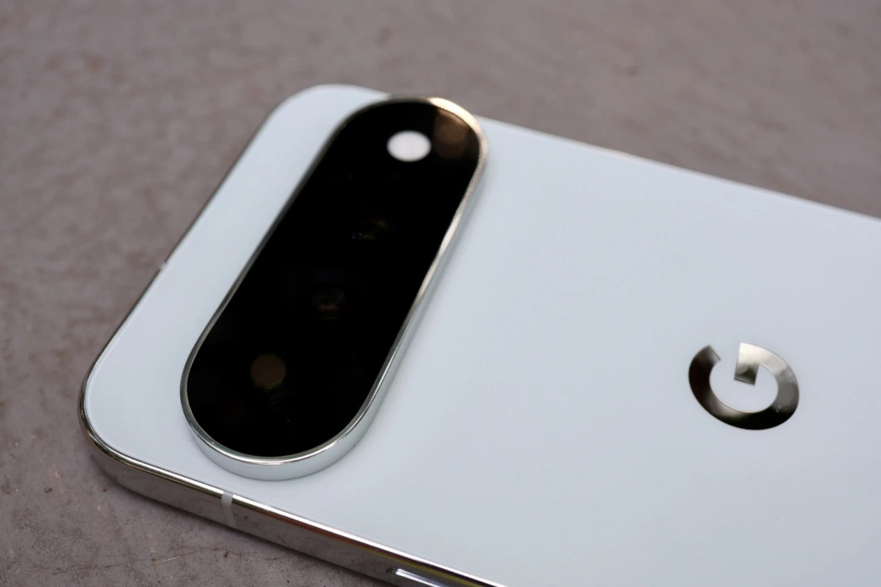 Close-up of the white Google Pixel 11 Pro XL rear camera bar and G logo.